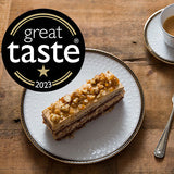 Flourless walnut coffee and chocolate cake with mousse and meringue layers, Great Taste Award winner, handcrafted in North London patisserie