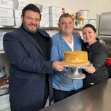 Adam Richman with Geanina and George from Prestige Patisserie and the Award Wining Medovik Cake