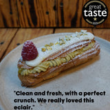 Freshly baked éclairs and cream puffs filled with vanilla custard and cream, made in our choux pastry masterclass