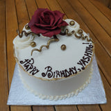 Personalised celebration cake with chocolate red rose decoration at Prestige Patisserie