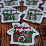 Handcrafted gingerbread house decorated for Christmas, baked by Prestige Patisserie