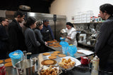 Geanina demonstrating Medovik Cake layering technique