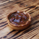 Maple-glazed pecan tart in golden pastry shell, handmade in North London