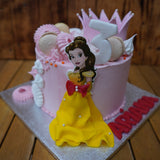 Handcrafted Princess Cake with pink and gold edible decorations, layered sponge, and custom design, made in North London patisserie