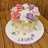 Elegant rose decorated cake design from Prestige Patisserie