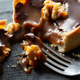 Salted caramel and chocolate tart with caramelised walnut brittle