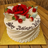 North London bakery’s signature whole cakes ready for collection with chocolate red rose and fresh berries