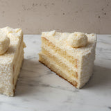 Malibu rum and coconut cake slice with light coconut cream layers