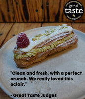 Freshly baked éclairs and cream puffs filled with vanilla custard and cream, made in our choux pastry masterclass