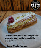 Freshly baked éclairs and cream puffs filled with vanilla custard and cream, made in our choux pastry masterclass