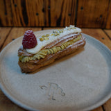 Enjoying freshly baked éclairs and cream puffs during the choux pastry baking workshop