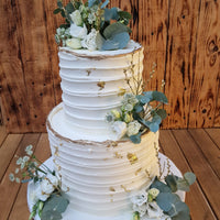 Wedding cake consultation with cake samples and Prosecco in North London bakery garden with head pastry chef Geanina