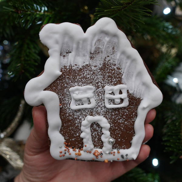 Handcrafted gingerbread house decorated for Christmas, baked by Prestige Patisserie