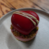 luxury strawberry pistachio heart dessert mirror glaze london patisserie