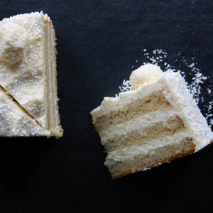 Malibu rum and coconut cake with whipped cream and handmade Raffaelo topping