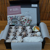 Prestige Patisserie medium Christmas gift box with mince pies, stollen, walnut cookies, and Christmas cake.
