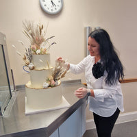 Wedding cake consultation with cake samples and Prosecco in North London bakery garden with head pastry chef Geanina