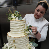 Wedding cake consultation with cake samples and Prosecco in North London bakery garden with head pastry chef Geanina