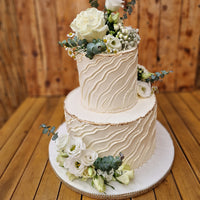 Wedding cake consultation with cake samples and Prosecco in North London bakery garden with head pastry chef Geanina