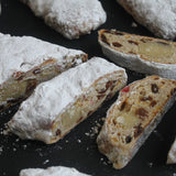 Artisan Christmas stollen bread with cherries, raisins, and almonds baked in North Londo